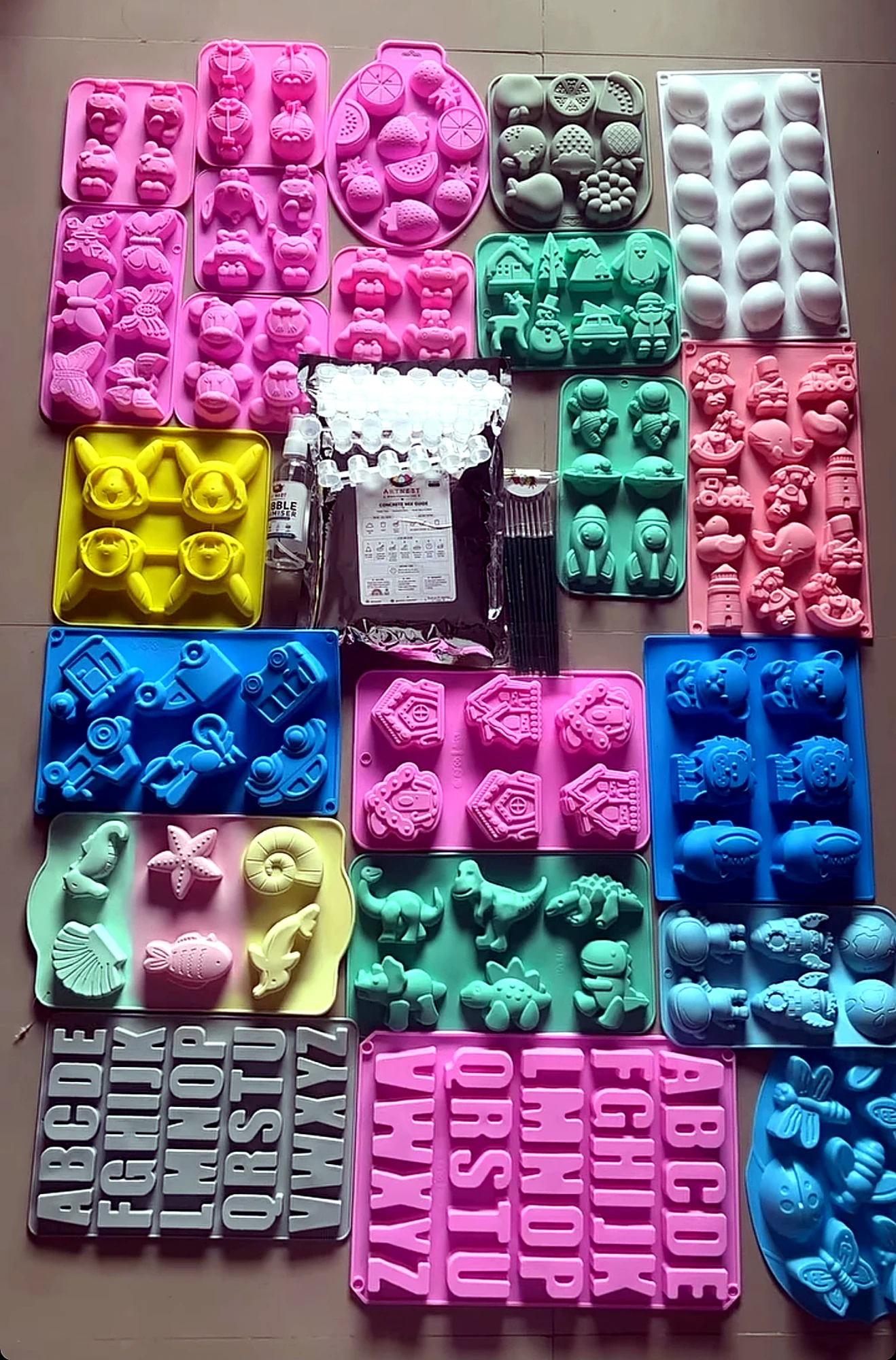 ArtNest silicone moulds and castings on a worktable